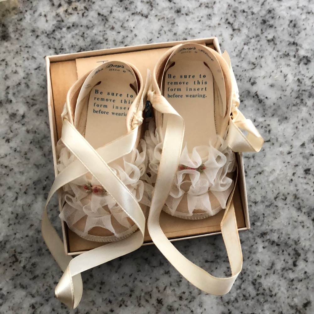 Collectible baby shoe. As shown.  Primal packaging.